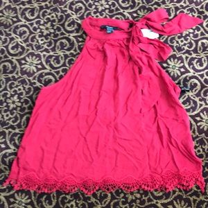 NWT Forever 21 red sleeveless blouse with high neck tie. Size small.